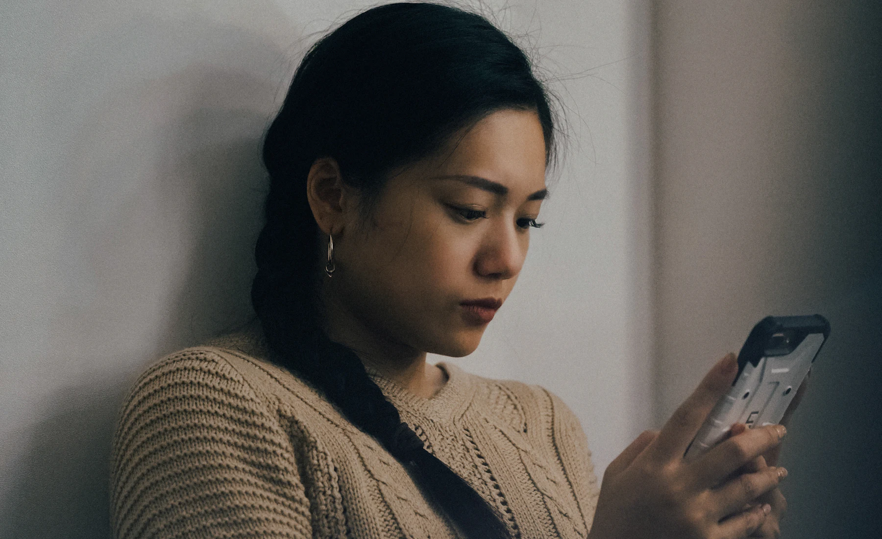 Someone checking a phone bill — AIS spend that grows points.
